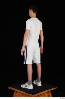  Johnny Reed dressed grey shorts sneakers sports standing white t shirt whole body 0004.jpg